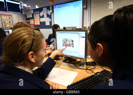 Pupils study in the IT/Media suite at the Heath Park Business and Enterprise College, Wolverhampton, which has been named England's most improved school, according to league tables. Stock Photo