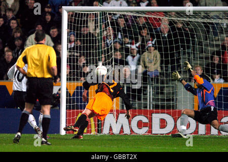 Soccer - Under 21 International Friendly - England v Holland. England's Dean Ashton (l) scores the opening goal of the game past Holland's goalkeeper Michel Vorm Stock Photo