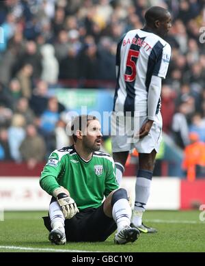 West Bromwich Albion goalkeeper Scott Carson (left) looks on after team ...