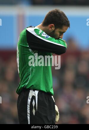 West Bromwich Albion goalkeeper Scott Carson (left) looks on after team ...