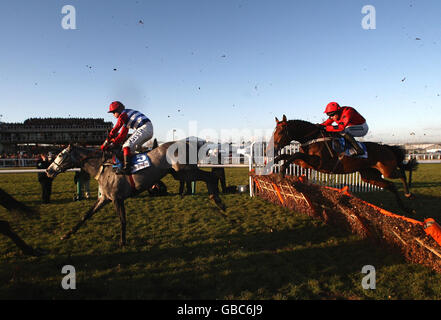 Walkon ridden by Robert Thornton (left) on their way to victory in the Wragge and Co Juvenile Novices' Hurdle race during the Festival Trials Day at Cheltenham Racecourse, Gloucestershire. Stock Photo