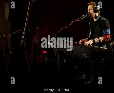 Chris Martin visits XFM - London Stock Photo