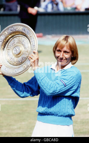 Martina Navratilova holds the trophy aloft after winning the ladies' singles for the fifth time Stock Photo