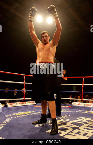 Boxing - British Lightwight Title Fight - John Murray v Lee McAllister - Robin Park Centre. Tyson Fury reacts after beating Marcel Zeller on the undercard of the British Lightweight Title fight at the Robin Park Centre, Wigan. Stock Photo