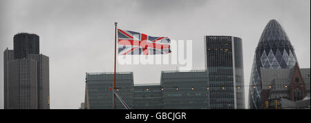 Storm clouds gather over the City of London as official figures today reveal the UK is officially in recession. The economy saw its worst output performance since 1980 in the final three months of 2008. Stock Photo