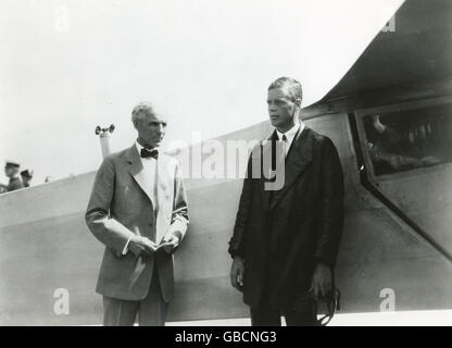 The Lone Eagle, Charles A. Lindbergh, stands with Henry Ford beside the 'Spirit of St. Louis,' the plane in which Col. Lindbergh flew the first trans-Atlantic solo flight in 1927. Stock Photo