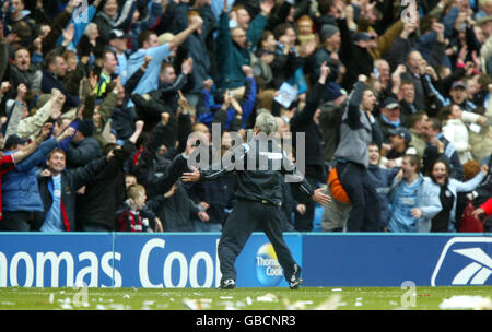 Soccer - FA Barclaycard Premiership - Manchester City v Manchester United. Manchester City's manager Kevin Keegan celebrates his sides win against Manchester United with the fans Stock Photo