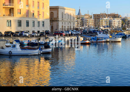 Colourful boats in Porto Piccolo, Syracuse, Sicily, Italy Stock Photo