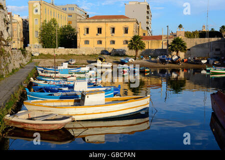 Colourful boats in Porto Piccolo, Syracuse, Sicily, Italy Stock Photo