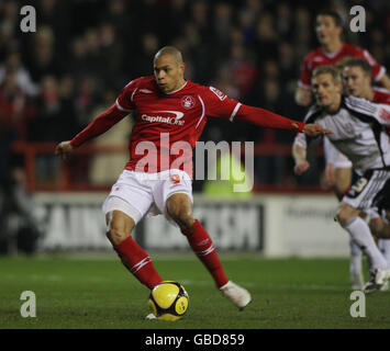 Nottingham Forest's Nathan Tyson scores from penalty spot during the FA Cup, Fourth Round Replay at the City Ground, Nottingham. Stock Photo