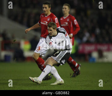 Soccer - FA Cup - Fourth Round Replay - Nottingham Forest v Derby County - City Ground. Derby County's Kris Commons scores their third goal during the FA Cup, Fourth Round Replay at the City Ground, Nottingham. Stock Photo