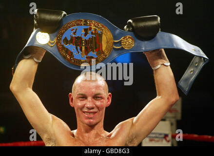 Nicky Cook celebrates becoming the new European Featherweight champion after defeating Cyril Thomas Stock Photo