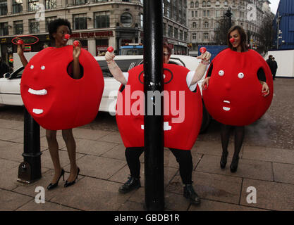 Jo Brand (centre) at the launch of Red Nose Day outside the Empire Leicester Square, London. Stock Photo