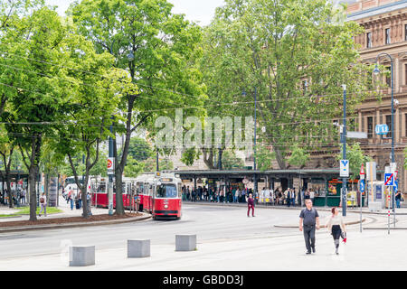 Tram and people on Burgring Ringstrasse in inner city of Vienna, Austria Stock Photo