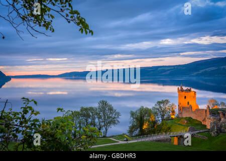 Urquhart Castle at twilight. The castle sits beside Loch Ness, near Inverness and Drumnadrochit, in the Highlands of Scotland. Stock Photo