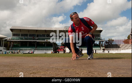 England coach Andy Flower looks at the wicket prior to the start of the third test at the ARG Cricket Ground tomorrow, Antigua. Stock Photo