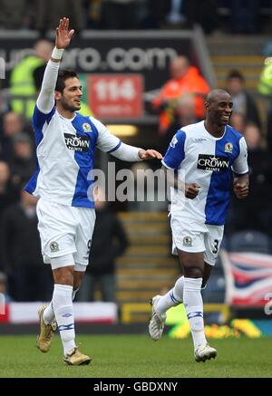 Blackburn Rovers' Roque Santa Cruz (left) celebrates after scoring the first goal of the game, with team mate Jason Roberts. Stock Photo
