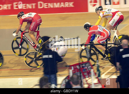 Sir Chris Hoy has a crash in the Mens Keirin Final at the Ballerup Super Arena, Copenhagen. Stock Photo