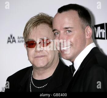 Sir Elton John and David Furnish arriving for the 17th annual Elton John AIDS Foundation Party to celebrate the 81st Academy Awards at the Pacific Design Center in Los Angeles. Stock Photo