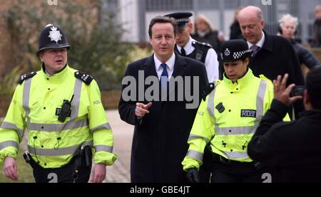 Conservative Party leader David Cameron meets with police officers in Paddington, central London. Stock Photo