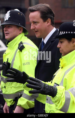 Conservative Party leader David Cameron meets with police officers in Paddington, central London. Stock Photo