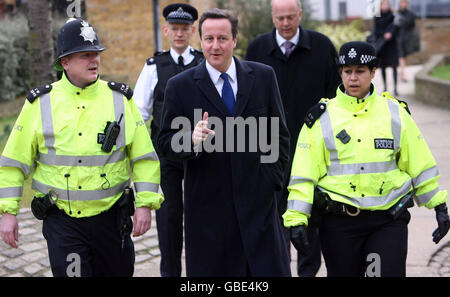 Conservative Party leader David Cameron meets with police officers in Paddington, central London. Stock Photo