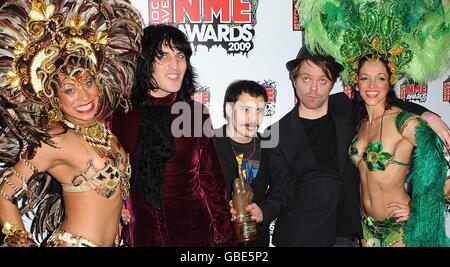 Noel Fielding, Michael Fielding and Dave Brown of The Mighty Boosh with the Best Television award at the Shockwaves NME Awards 2009 at the 02 Academy, Brixton, London Stock Photo