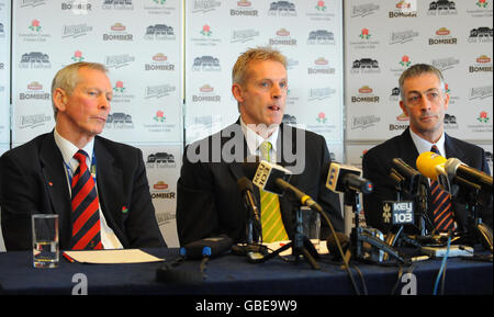 Peter Moores (centre) is unveiled as the new head coach of Lancashire County Cricket Club alongside Chief Executive Jim Cumbes and Director of Cricket Mike Watkinson (right) during the press conference at Old Trafford Cricket Ground, Manchester. Stock Photo