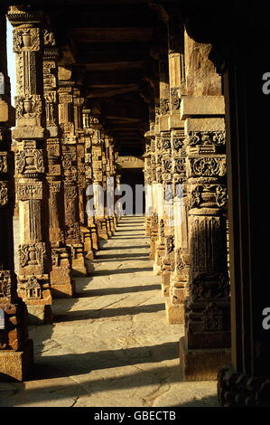 geography / travel, India, Delhi, mosque Quwwat-al-Islam, built: since 1199 under Qutb ad Din Aibak, interior view,  exterior view, detail with columns, Additional-Rights-Clearences-Not Available Stock Photo