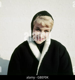 fashion, 1950s, ladies' fashion, winter collection, woman wearing black headscarf and black coat with white fur collar, Additional-Rights-Clearences-Not Available Stock Photo