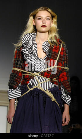 A model wears a creation from the Charles Anastase Collection Show at London Fashion Week. Stock Photo