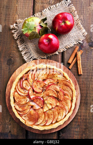 Apple pie on wooden background, top view Stock Photo