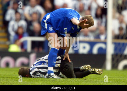 Newcastle United's Alan Shearer lies injured after an alleged stamp by Chelsea's Robert Huth in which the FA will be investigating Stock Photo