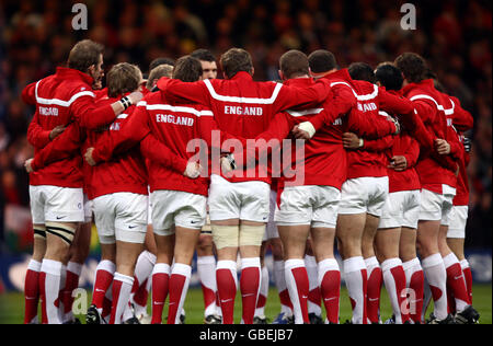 England's players form a huddle before the start of the the fourth T20