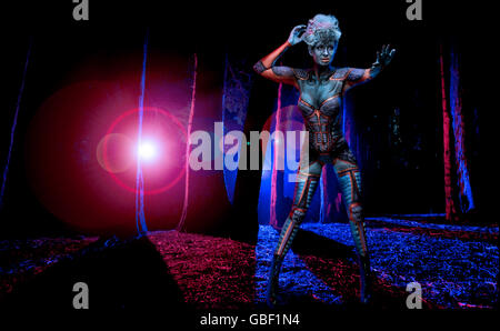 Body paint alien in woods Stock Photo