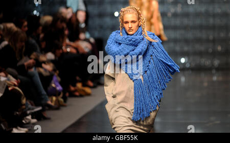 A model wears a creation from the Top Shop Unique Collection during London Fashion Week. Stock Photo