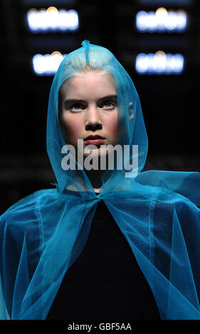 A model wears a creation from the Peter Jensen Collection Show at London Fashion Week. Stock Photo