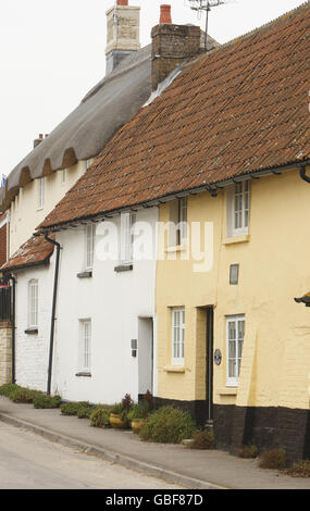 GV of the Martyr's Cottages in the Dorset village of Tolpuddle where George Standfield lived. Stock Photo