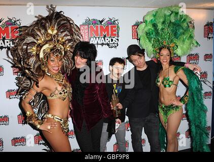 Noel Fielding, Michael Fielding and Dave Brown of The Mighty Boosh with the Best Television award at the Shockwaves NME Awards 2009 at the 02 Academy, Brixton, London Stock Photo