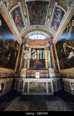 Rome. Italy. Contarelli Chapel, Chiesa di San Luigi dei Francesi, The Inspiration of St Matthew (centre), by Caravaggio. Stock Photo