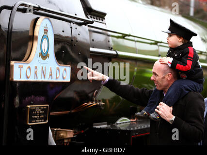 Jensen Readhead, 2, from Edinburgh, with dad Clive, looking at the Tornado steam train, operated by A1 Steam Locomotive Trust after arriving at Waverley Station in Edinburgh.