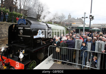 Members of the public get a view of the Tornado steam train, operated by A1 Steam Locomotive Trust after arriving at Waverley Station in Edinburgh.