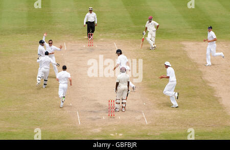 England's Graeme Swann celebrates dismissing West Indies' Ryan Hinds during the fourth test at Kensington Oval, Bridgetown, Barbados. Stock Photo