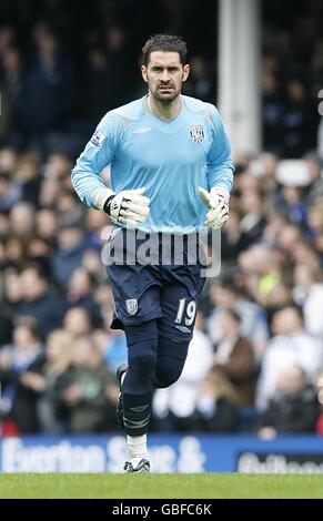 West Bromwich Albion goalkeeper Scott Carson (left) looks on after team ...