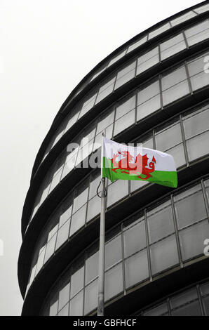 The flag of St. David flies next to City Hall, London, after it was raised to mark the Saint's day today. Stock Photo