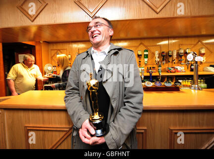 Oscar winning director Danny Boyle smiles during a visit to St Mary's Catholic Social Club in Radliffe near Manchester. Stock Photo