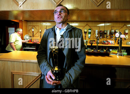 Oscar winning director Danny Boyle smiles during a visit to St Mary's Catholic Social Club in Radliffe near Manchester. Stock Photo