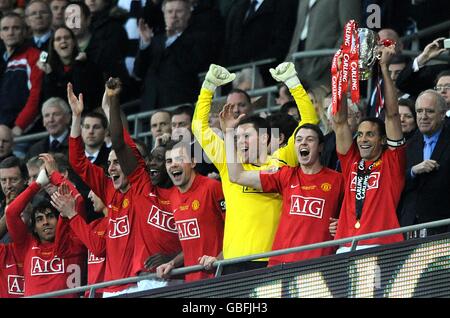 Soccer - Carling Cup - Final - Manchester United v Tottenham Hotspur - Wembley Stadium. Manchester United captain Rio Ferdinand lifts the Carling Cup trophy Stock Photo