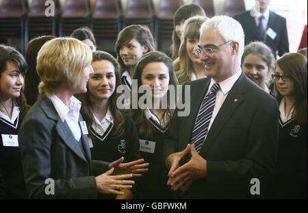 Chancellor Alistair Darling chats with pupils and staff during a visit to the Millais School in Horsham, West Sussex ahead of this weekend's G20 Finance Meeting in the county. Stock Photo