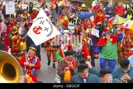 Members of Clowns International parade along the seafront in Bognor Regis, West Sussex,during the annual clowns parade in the town. Stock Photo